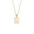 Golden necklace featuring a rectangular Taurus zodiac pendant with white shell inlay - Taurus