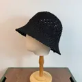 Hollow knit black bucket hat with intricate crochet texture and breathable sun shade design - M / Black
