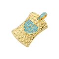 Luxurious gold heart pendant with turquoise inlay on a textured rectangular plate - Gold with Turquoise Heart Pendant