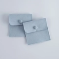 Light blue faux suede jewelry pouches with snap button closure for rings and small items - Light Blue