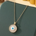 Collier Mauvais Œil doré avec émail bleu et bordure en zircons cubiques scintillants - A14 - Or