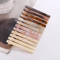 Set di 11 eleganti fermagli per capelli in acetato con vari motivi marmorizzati - Set da 12