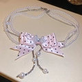 Detail of multi-layer pearl necklace featuring a pink polka dot satin bow and crystals - Pink Polka Dot Bow Silver Chain