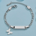 Detail of silver stainless steel Figaro chain with polished bar and butterfly charm - Silver Butterfly
