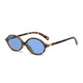 Oval tortoiseshell frame sunglasses with blue lenses and elegant gold metal accents - Tortoise Frame Blue Lens 19