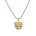 Macro detail of golden bear pendant with pink and white cubic zirconia on a bead chain - Gold Pink Zirconia