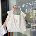 White Zakka canvas tote bag featuring floral rabbit print and green braided rope handles - Rabbit Paradise