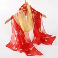 Elegant red chiffon scarf featuring butterfly and flower prints on a wooden hanger - Red Butterfly Print