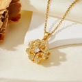 Collana con ciondolo a fiore rotante a doppio strato in acciaio dorato e zirconi lucenti - Collana con trifoglio rotante dorato (T014)