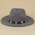 Detail of silver rivets and engraved buckles on a grey wool felt western jazz hat - M(56-58cm) / Gray