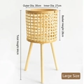 Large woven bamboo planter with wooden tripod legs and dimensions 64cm height and 30cm width - Grid Pattern Large