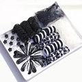 Kids black and white hair accessories set featuring clips, bands, and elastic ties - 780PCS Black and White Boxed Set