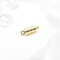 Golden bamboo-shaped magnetic clasp for DIY necklaces and bracelets on white pedestal - 6mm / Gold