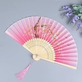 Pink gradient cherry blossom folding fan with bamboo ribs and matching tassel detail - Butterfly Loving Cherry Blossom Pink