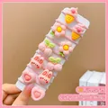 Detailed view of 10-piece cute pink cartoon hair ties set including cherry and bunny designs - Pink Cherry 10-Piece Set