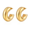 Close-up of chunky gold-plated C-shape hoop earrings with a polished surface finish - Chunky C-Shape Gold