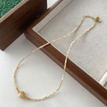 Beaded natural stone necklace with a heart-shaped shell pendant and golden metal spacers - Heart Shell Pendant Beaded Necklace (XL0396)