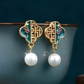 Macro shot of Chinese style enamel butterfly earrings with white pearls on a green ceramic bowl - CP997-Emerald Green Spherical Pearl
