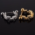 Silver and gold surgical steel ear cuffs with brilliant zircons on a black background - NO 11