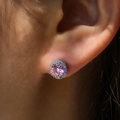 Close-up of pink halo stud earrings featuring round cut cubic zirconia in silver setting - White Gold with Pink Zircon