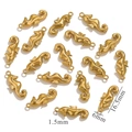 Detailed view of seahorse pendant measurements 16.5mm height in polished gold steel - Seahorse / Gold