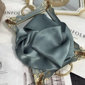 Close-up of elegant grey-blue silk scarf folded on a vintage mirror tray background - 15x150cm / Autumn Smoke Blue