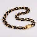 Dettaglio catena cubana bicolore nero e oro in acciaio inossidabile con chiusura - Collana nera dorata