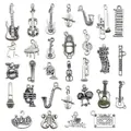 Set ciondoli musicali in argento antico con chitarra, violino e microfono per gioielli fai da te - Misto 30 Pezzi Simboli Musicali Argento Antico