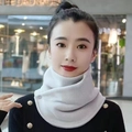 Creamy white polar fleece neck warmer with snap button closure worn by a model - Double Button Neck Warmer - Light Gray (1pc)