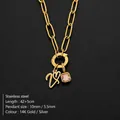 Gold plated stainless steel chain necklace featuring V-letter and pink square gemstone - Letter V (XNL0097)