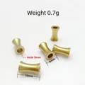 Dettaglio di perline distanziatrici a clessidra in acciaio inox da 10mm per gioielli fai da te - Ottone 6x10mm Foro 3mm