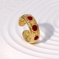 Detailed shot of vintage gold-plated stainless steel ring with red enamel dot accents - Wave Border Red Drip Style (JR463)