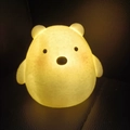 Cute bear-shaped LED night light in silicone with soft yellow glow for bedside decor - Chubby Bear Night Light