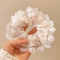 Floral fabric scrunchie with white lace trim held against a soft beige background - Small Floral Lace 3#