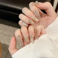 Luxe champagne cat-eye press-on nagels met 3D-vlinder en strass steen accenten - Extra Klein (XS)