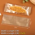 100pcs golden long food packaging bags 5.5x15cm for desserts and caramel almond snacks - Golden Merry Christmas / Pack of 100