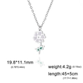 Minimalist stainless steel flower necklace with light purple petals and green leaf pendant - Steel Color - Cosmos