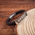 Men's brown woven leather bracelet with silver bicycle chain link on wood base - Dark Brown