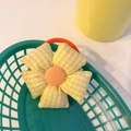 Sonnenblumen Haargummi mit gelbem Karomuster und leuchtend orangefarbener Mitte - Gelbe Karoblume