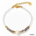 Handmade beaded bracelet with white pearl, transparent crystals, and gold stainless steel - Gold Bracelet with White Pearl (SAK891)