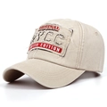 Detail of vintage washed baseball cap featuring embroidered patch and distressed edges - Adjustable / Off White