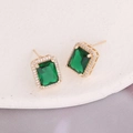 Detail showing rectangular emerald cut earrings with zircon halo on a ceramic tray - 2# Green Stud Earrings