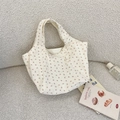 Close-up of corduroy floral tote bag texture with aesthetic background props - Floral Rose