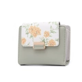 Detailed macro view of sage green faux leather wallet with floral print and gold snap closure - Green (Flower)