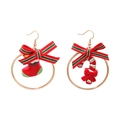 Asymmetric Christmas earrings featuring a festive red stocking and candy cane design - Bow Candy Cane Hoop Earrings