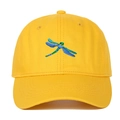Detailed close-up of colorful dragonfly embroidery on yellow cotton baseball cap - Yellow