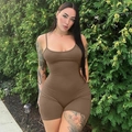 Detailed view of brown slim fit romper with spaghetti straps and ribbed knit texture - Khaki