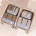 Travel luggage organizer set in beige and coffee brown with mesh and buckle straps - Grey 4-Piece Set