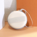 Off-white circular EVA hard shell storage case with grey zipper and carry lanyard - Folding Glasses Case