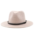 Detail of light beige straw fedora featuring a black leather band with silver metal studs - Pink